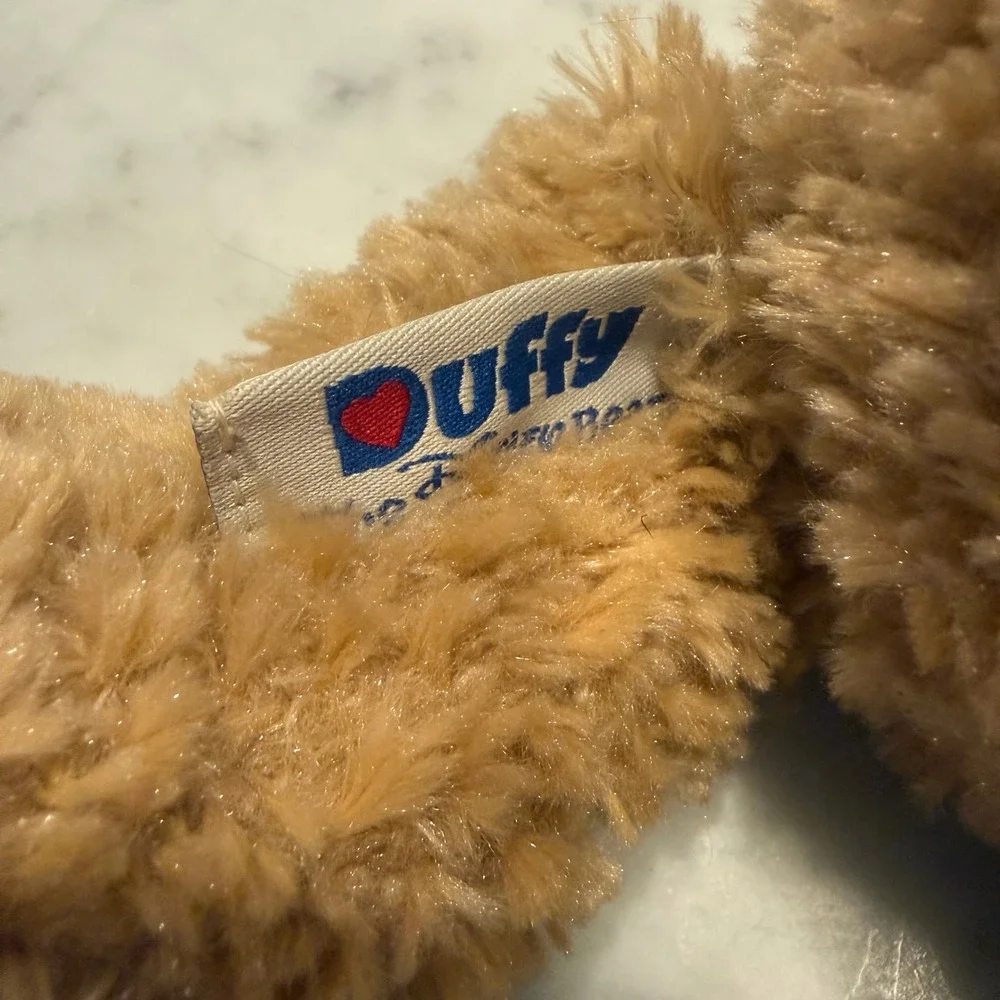 Preowned Disney Parks‎ Duffy the Disney Bear plush with original tag attached